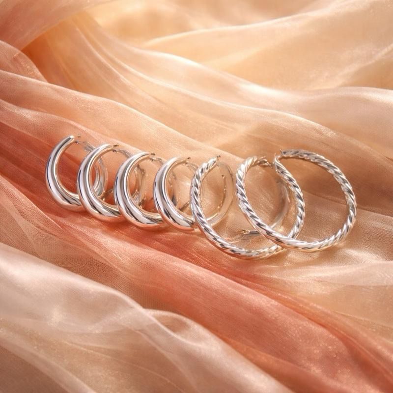 Orecchini “TRIS 561”